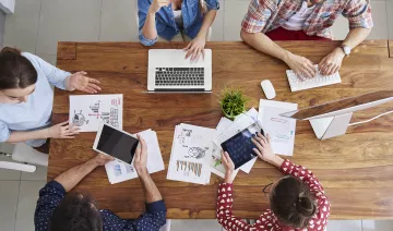 top-view-coworkers-team-working-office.jpg